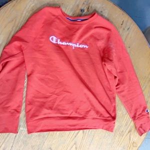 champion red says champion on it size- L